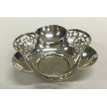 An attractive pierced silver sweet dish. London. A