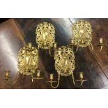 A rare set of four silver gilt candle wall lights