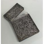 A 19th Century silver filigree card case with hing