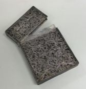 A 19th Century silver filigree card case with hing