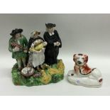 A Staffordshire figure depicting three figures and
