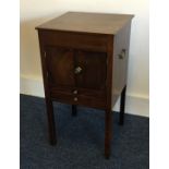 A Georgian mahogany two drawer commode on square f