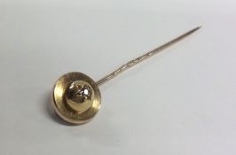 A 14 carat gold diamond stick pin. Approx. 5 grams