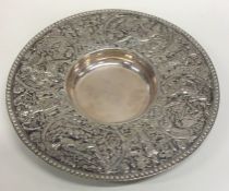 An early Dutch silver embossed dish decorated with