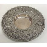 An early Dutch silver embossed dish decorated with