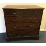 A Georgian mahogany chest of three long and two sh