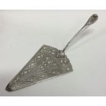 An attractive Georgian silver pudding trowel with