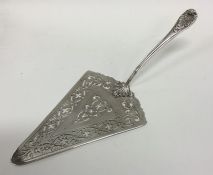 An attractive Georgian silver pudding trowel with