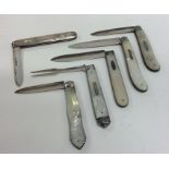 A group of six silver and MOP fruit knives contain
