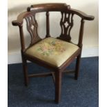 A Georgian oak corner chair. Est. £30 - £50.