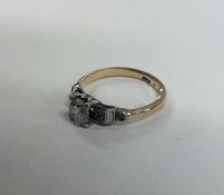 A good diamond single stone ring in platinum and g