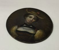 A circular oil painting depicting a lady on papier