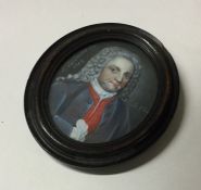 An Antique oval painted framed ivory miniature of