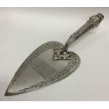 A heavy good quality engraved silver trowel with t