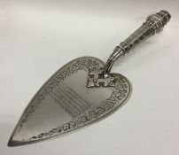 A heavy good quality engraved silver trowel with t