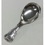 A heavy Victorian silver caddy spoon with shell th
