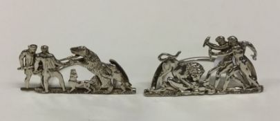 A good pair of silver menu holders decorated with