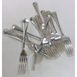 A set of twelve rat tail silver dessert forks. Lon