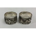 A pair of Chinese silver napkin rings. Punched to