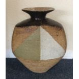 A large stoneware vase of textured form with geome