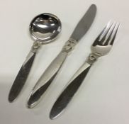 GEORG JENSEN: A good three place cutlery setting o