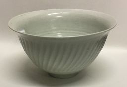 A celadon glazed porcelain studio pottery bowl of