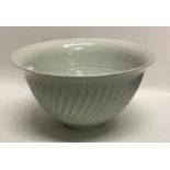 A celadon glazed porcelain studio pottery bowl of
