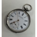 A silver open faced pocket watch with white enamel