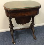 A Victorian hinged top games table with inlaid dec