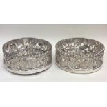 A good pair of embossed silver wine coasters decor