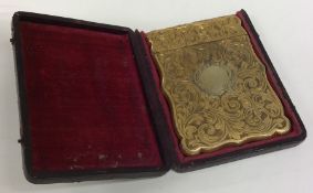 A fine quality engraved card case contained within