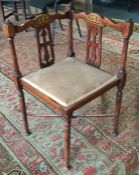 An early Edwardian inlaid corner chair. Est. £20 -