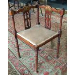 An early Edwardian inlaid corner chair. Est. £20 -