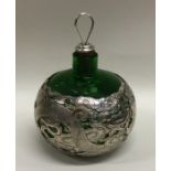 An unusual circular silver scent bottle attractive