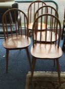 A set of four Ercol bow back chairs. Est. £40 - £6