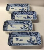 A set of four rectangular Chinese blue and white s