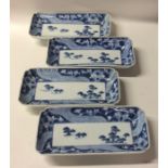 A set of four rectangular Chinese blue and white s