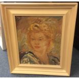 A framed portrait on board of a lady with blond ha
