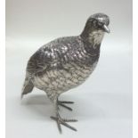 A good silver figure of a quail with textured body