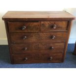 A Victorian mahogany chest of three long and two s