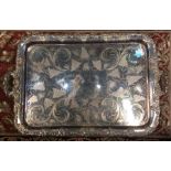 A large silver plated tray. Est. £20 - £30.