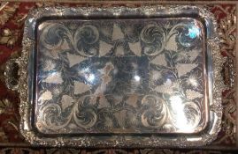 A large silver plated tray. Est. £20 - £30.