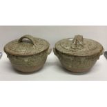 A pair of lidded stoneware pottery soup bowls with