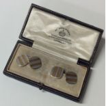 A good boxed set of gold and platinum cufflinks. A