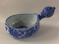 A Chinese blue and white shaped dish decorated wit