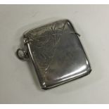 A large engraved silver vesta case with hinged top