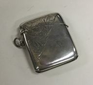 A large engraved silver vesta case with hinged top