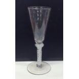 A Georgian opaque drinking glass with knobbed stem