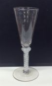 A Georgian opaque drinking glass with knobbed stem