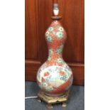 A tall Chinese balloon vase attractively decorated